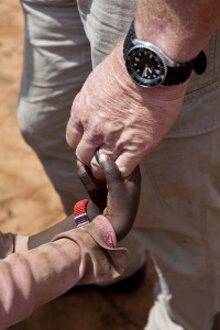 missionary_holding_hand